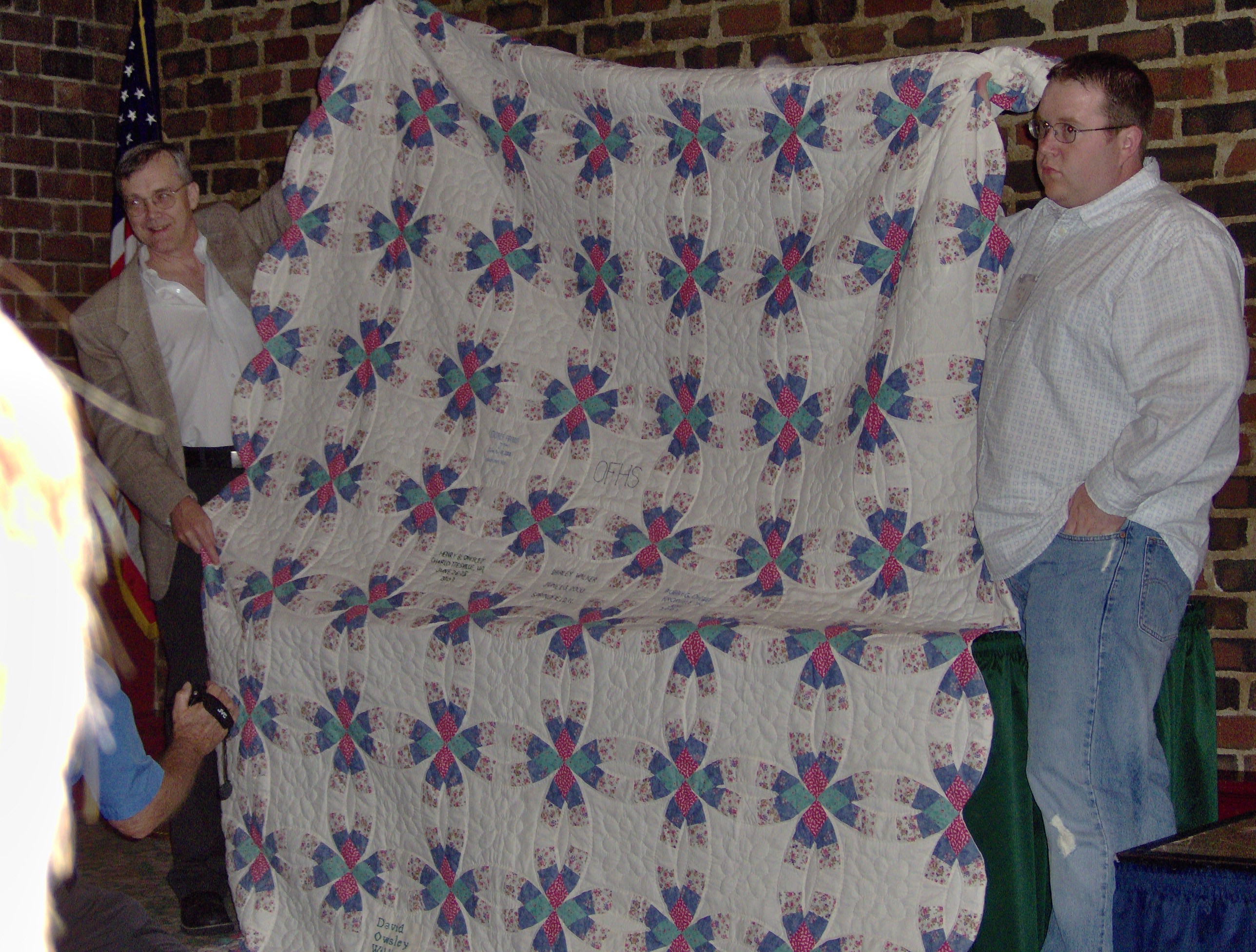 Gary Toms and Joseph Owsley showing the Owsley Quilt (2006 OFHS Meeting in Chattanooga